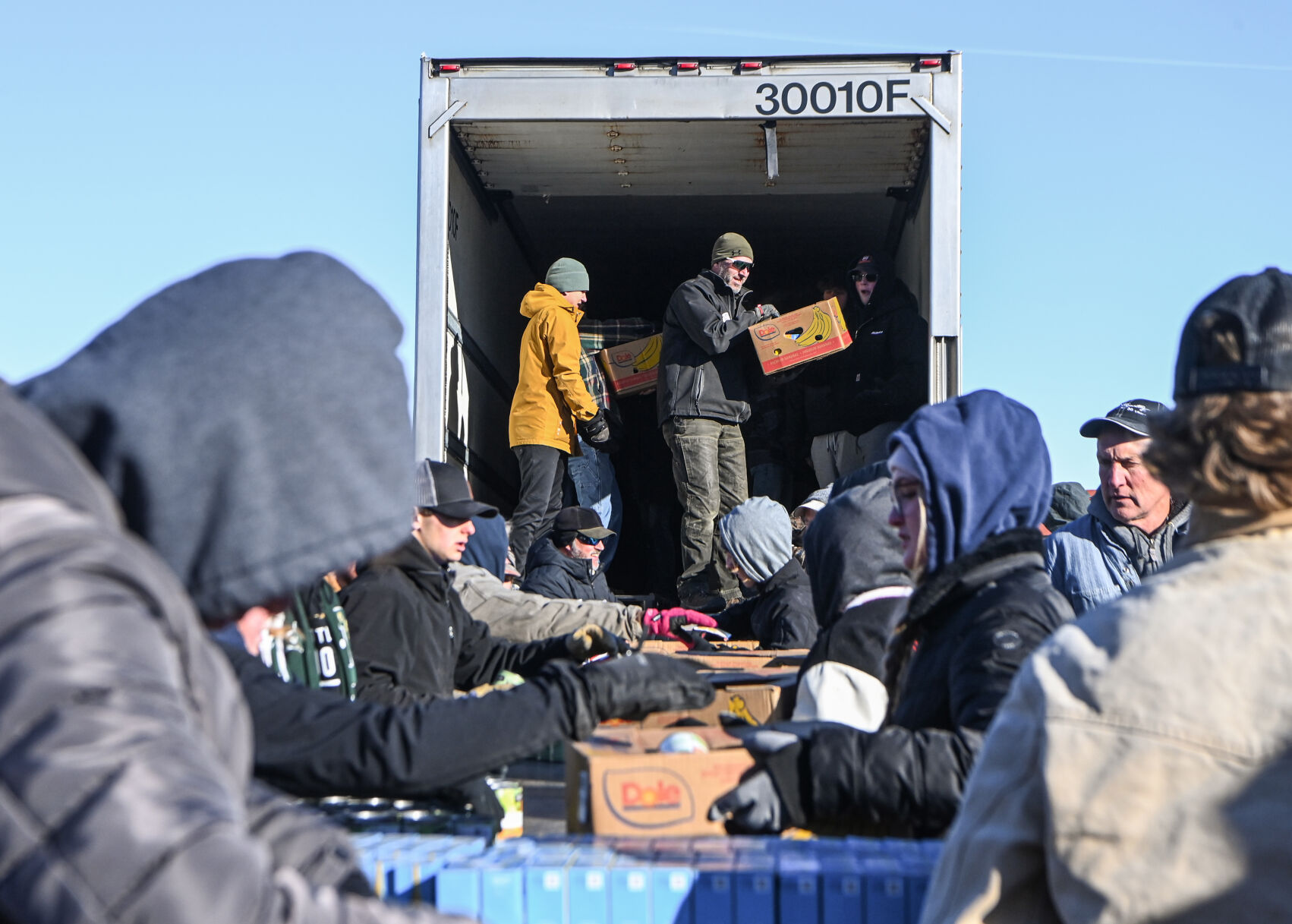 Students and volunteers gather to fill boxes for Flakesgiving